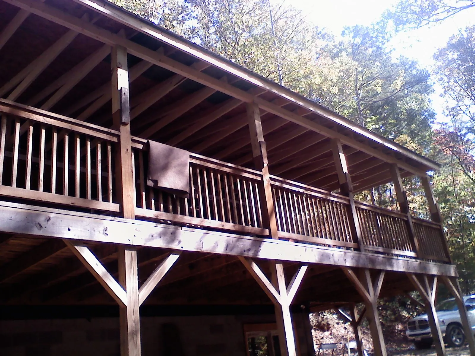 Timber framing under a new elevated porch and deck — Roof Leak Repair in Mazon by Roofing Brothers